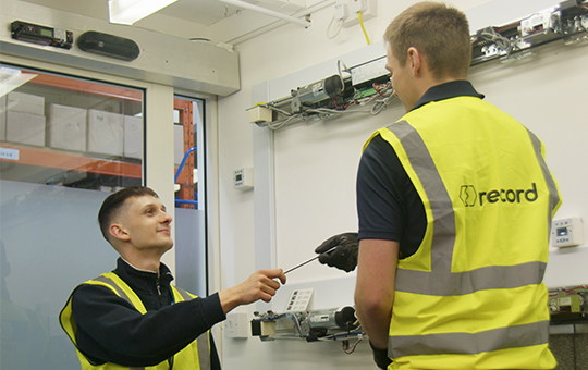 Josh and Harry working together apprentices